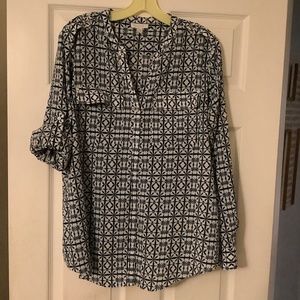 Business casual blue and white design button front top with two front pockets